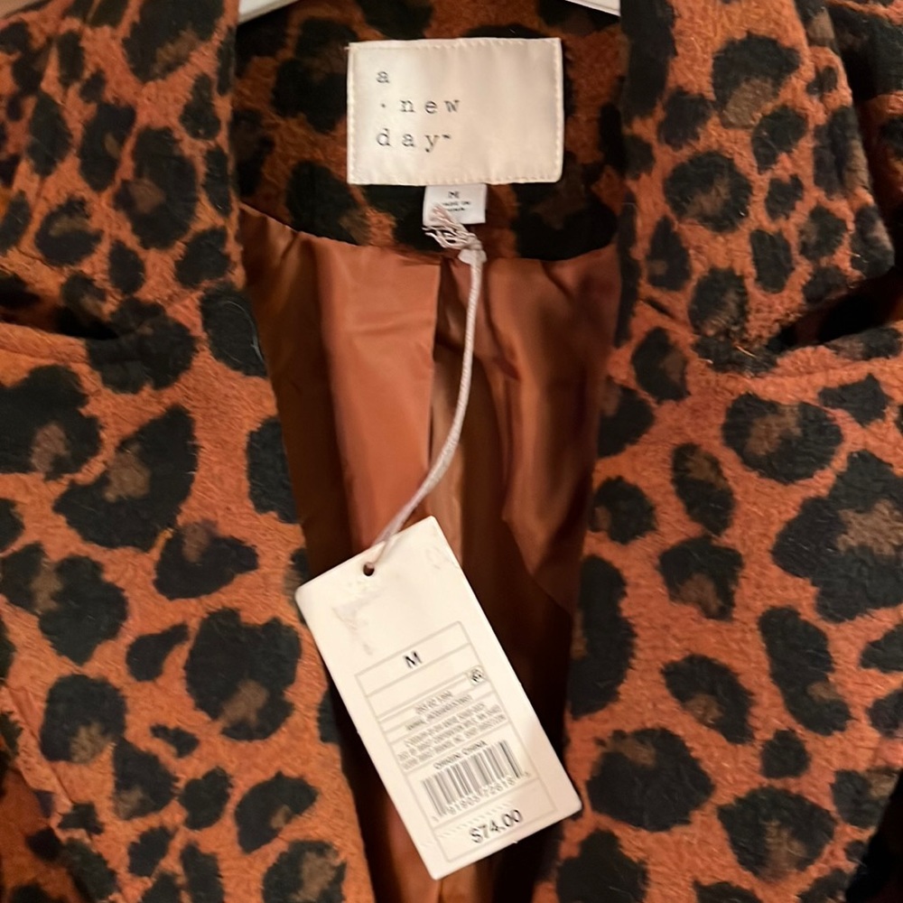 Women’s long animal print coat